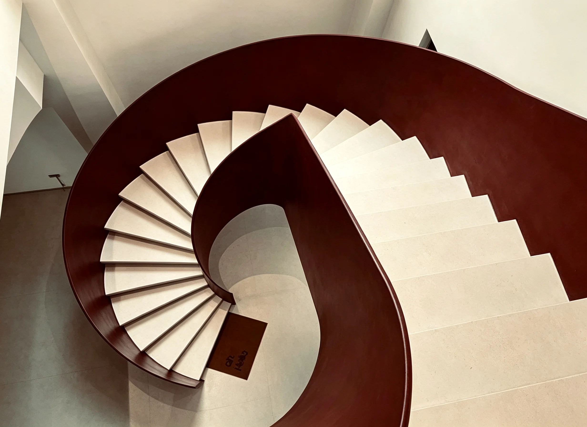 Bespoke sculptural steel staircase designed for a luxury residential interior